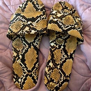 Brown snakeskin slides